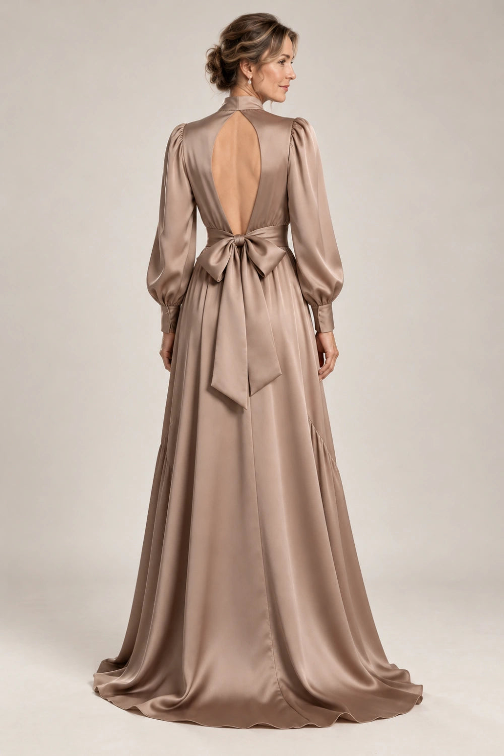 Back view of the taupe occasion gown.