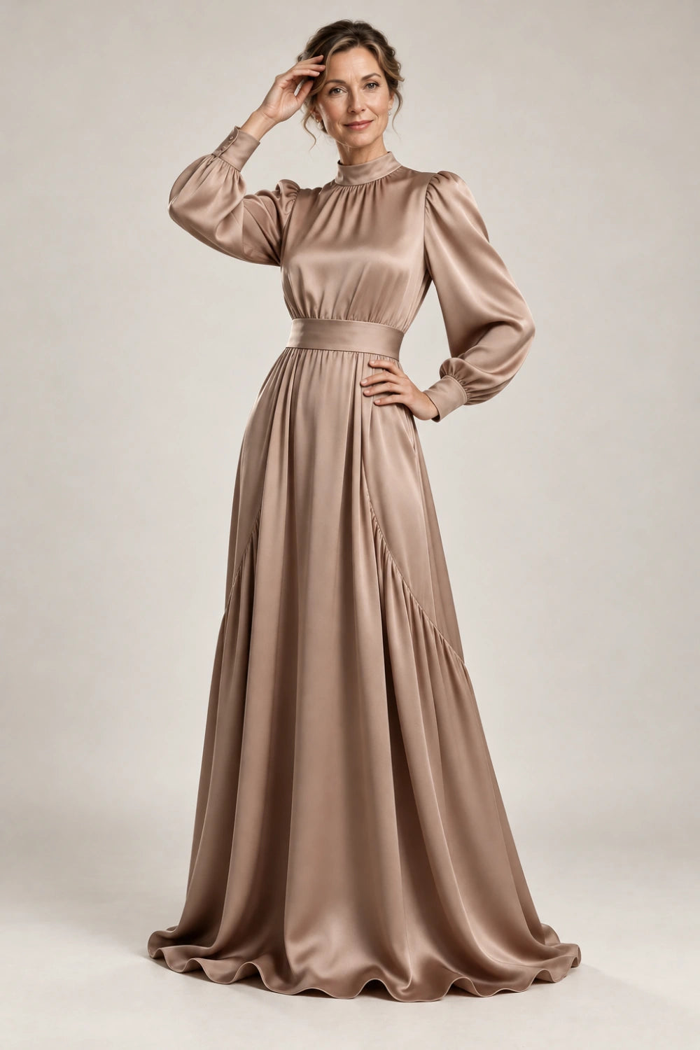 Editorial front view of the taupe occasion gown.