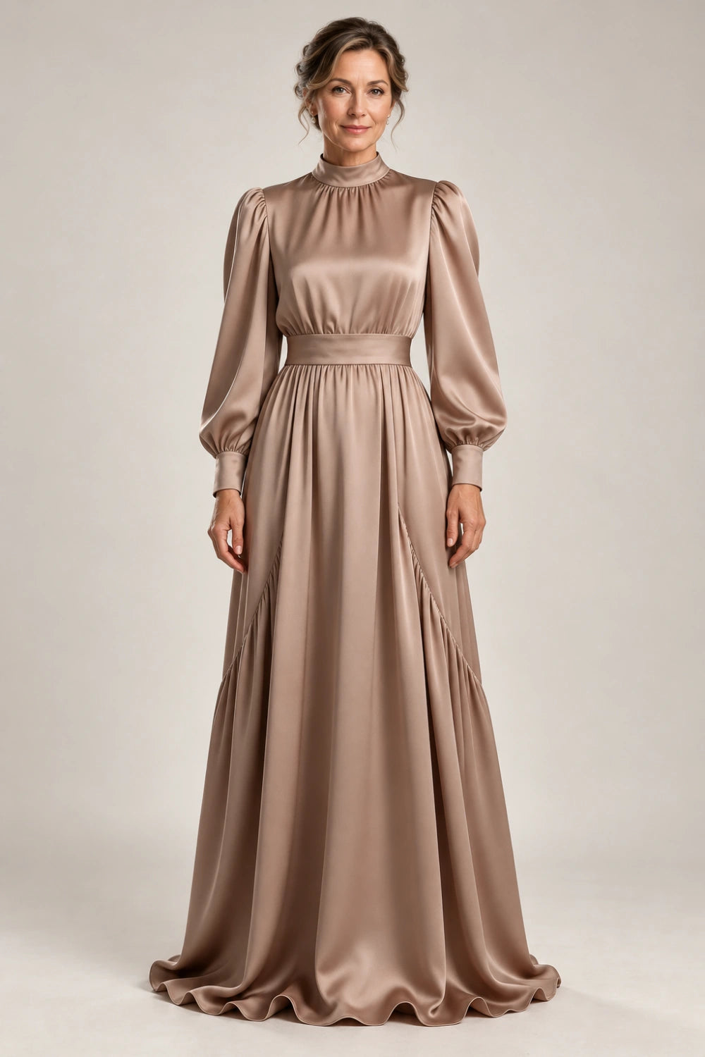 Front view of the taupe high-neck gown with bishop sleeves and a wide waistband.