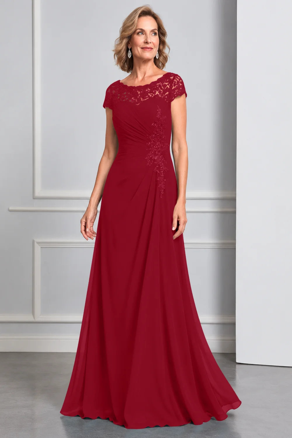 Front view of a wine red dress with lace cap sleeves and side waist decoration.