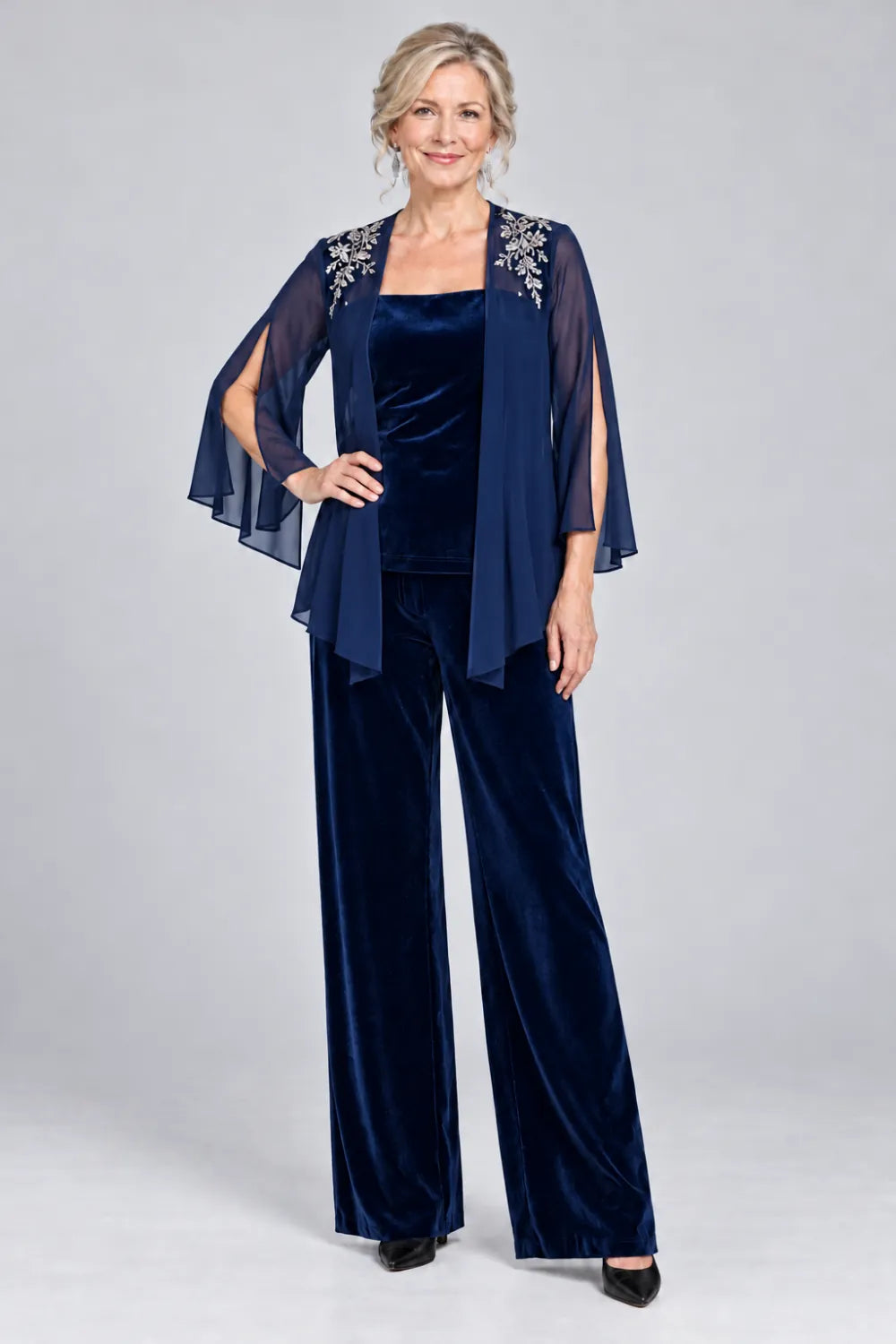 Navy Blue pant suit with floral shoulder embroidery and square-neck top, front view.