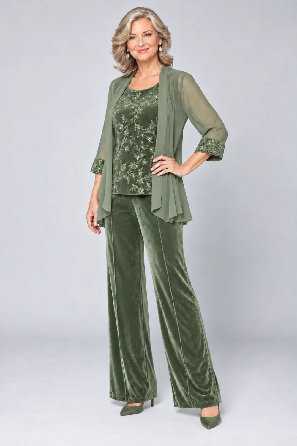 Sage Green pant suit with tonal floral top and matching cuff panels, front view.