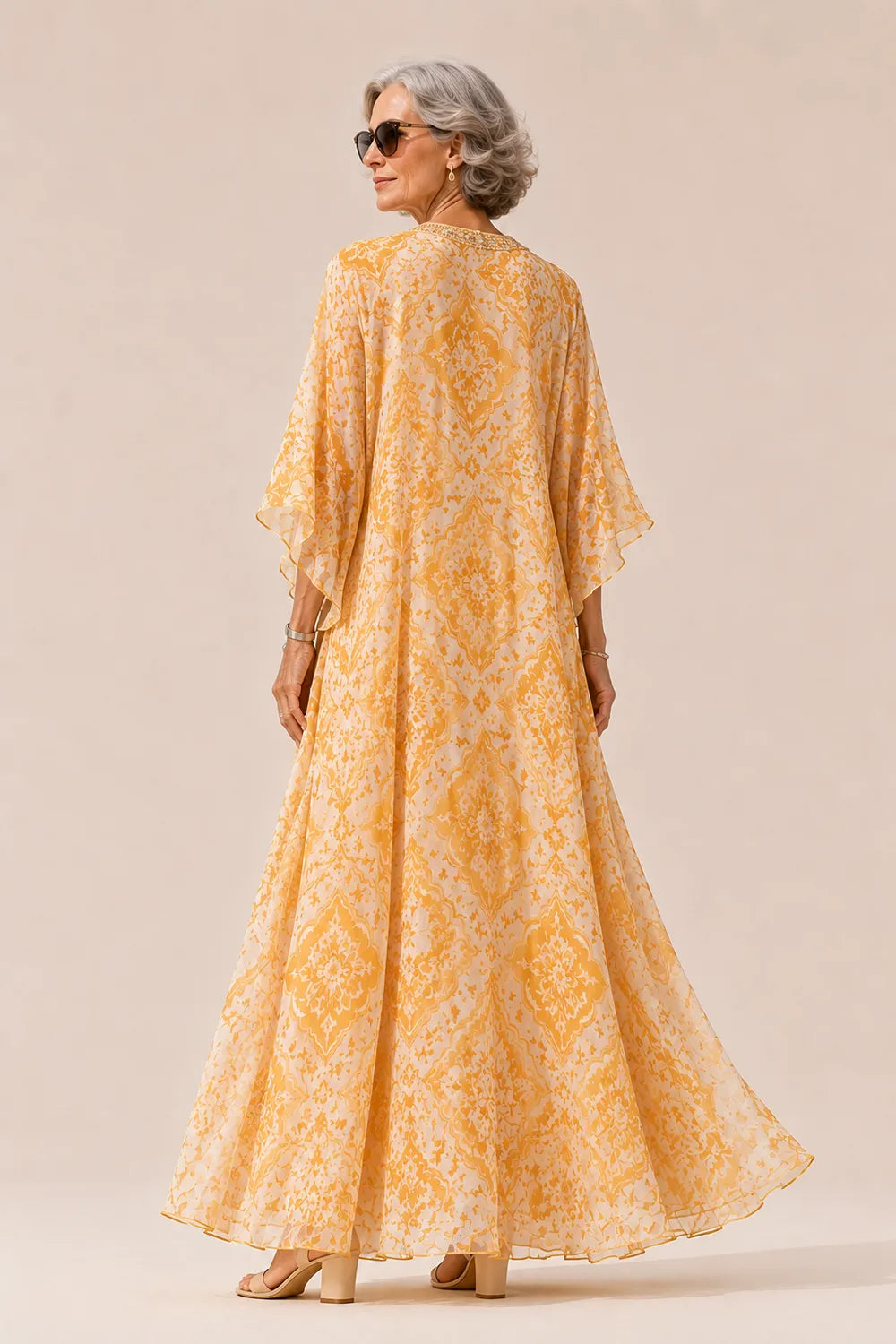 Embellished V-Neck Flowing Maxi Dress